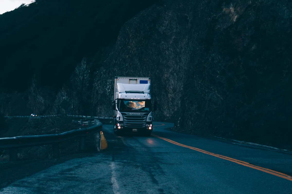 Trucking driving down a rainy mountain